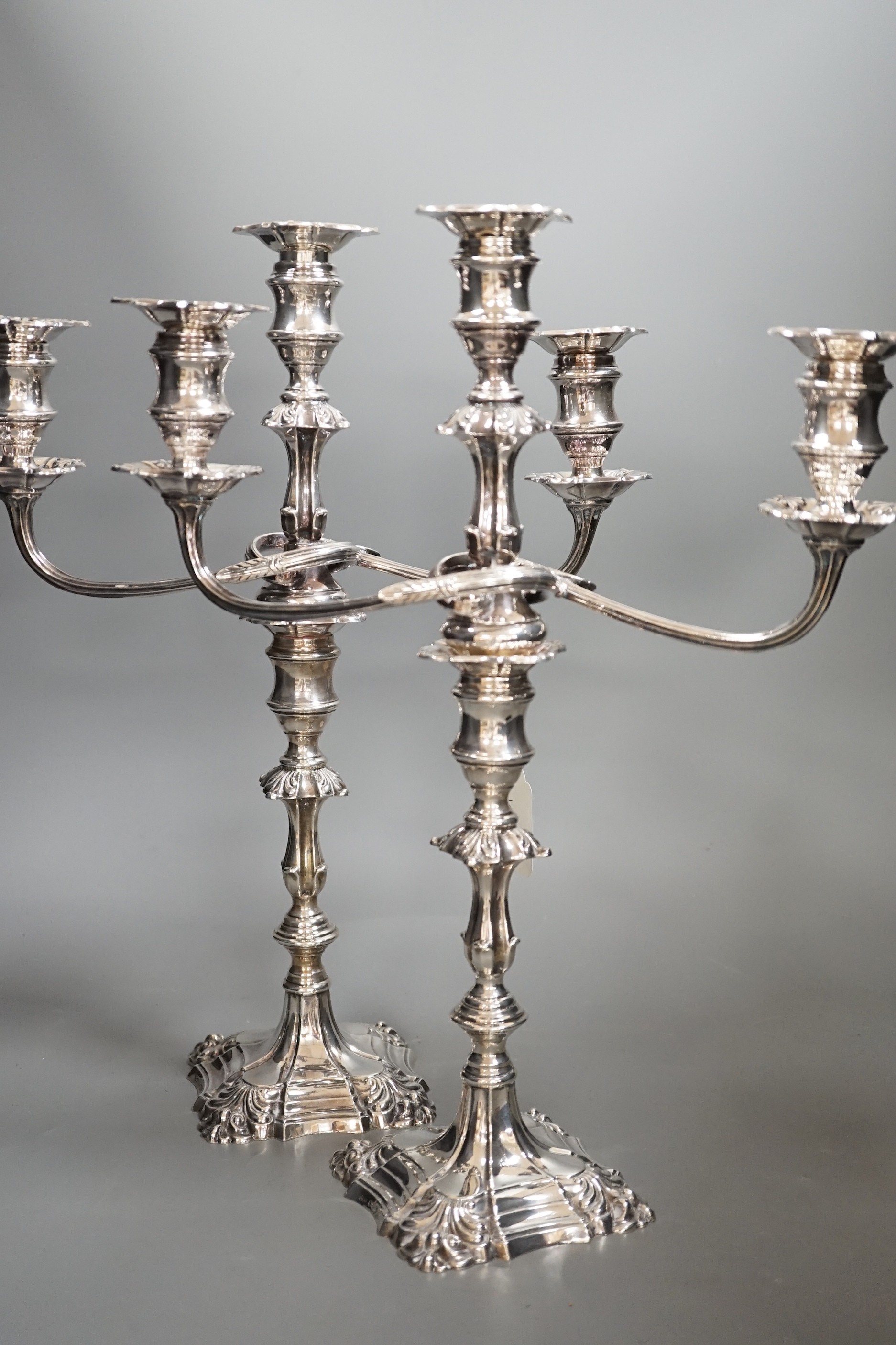 A pair of 1950's silver two branch, three light candelabra, by Atkin Brothers, Sheffield, 1954, height, 40cm, weighted, arms weigh 56oz.